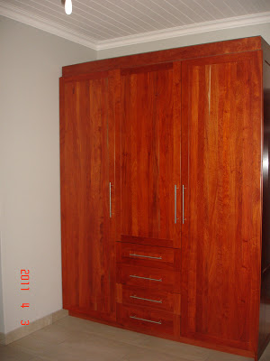 Built-in wardrobe made of rosewood with four drawers and a lot of storage space
