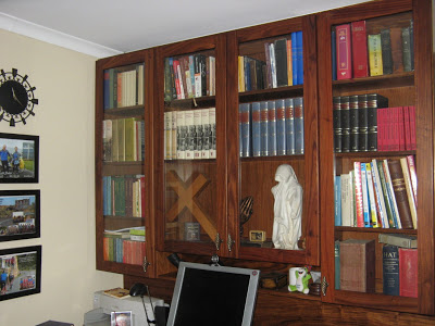 Built-in book-shelf for the study. The frames of the glass doors are made of solid kiaat