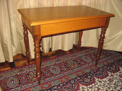Yellow-wood table with stinkwood legs. The top was replaced and the table renovated 