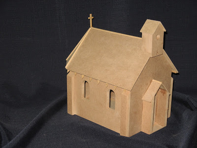 Model of a small church. This little church can only seat twelve people