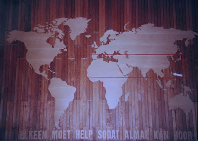 Large world map cut by hand from 3mm ply wood (teak finish).  This piece can be viewed in front of the Dutch Reformed Church Wonderboompoort.